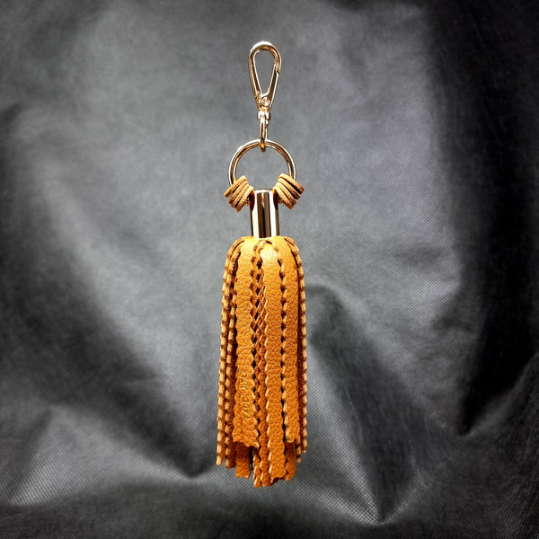 Floating Amber Leather Tassel Accessory