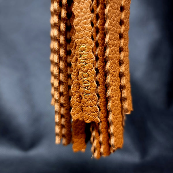 Floating Amber Leather Tassel Accessory